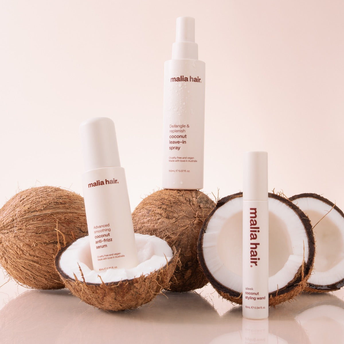 Coconut anti-frizz serum, leave-in spray and styling wand with coconuts